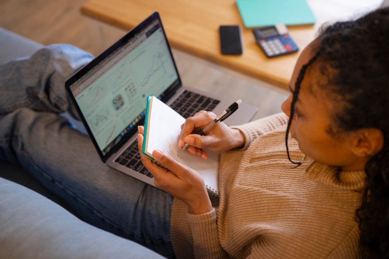 Woman studying at a laptop
